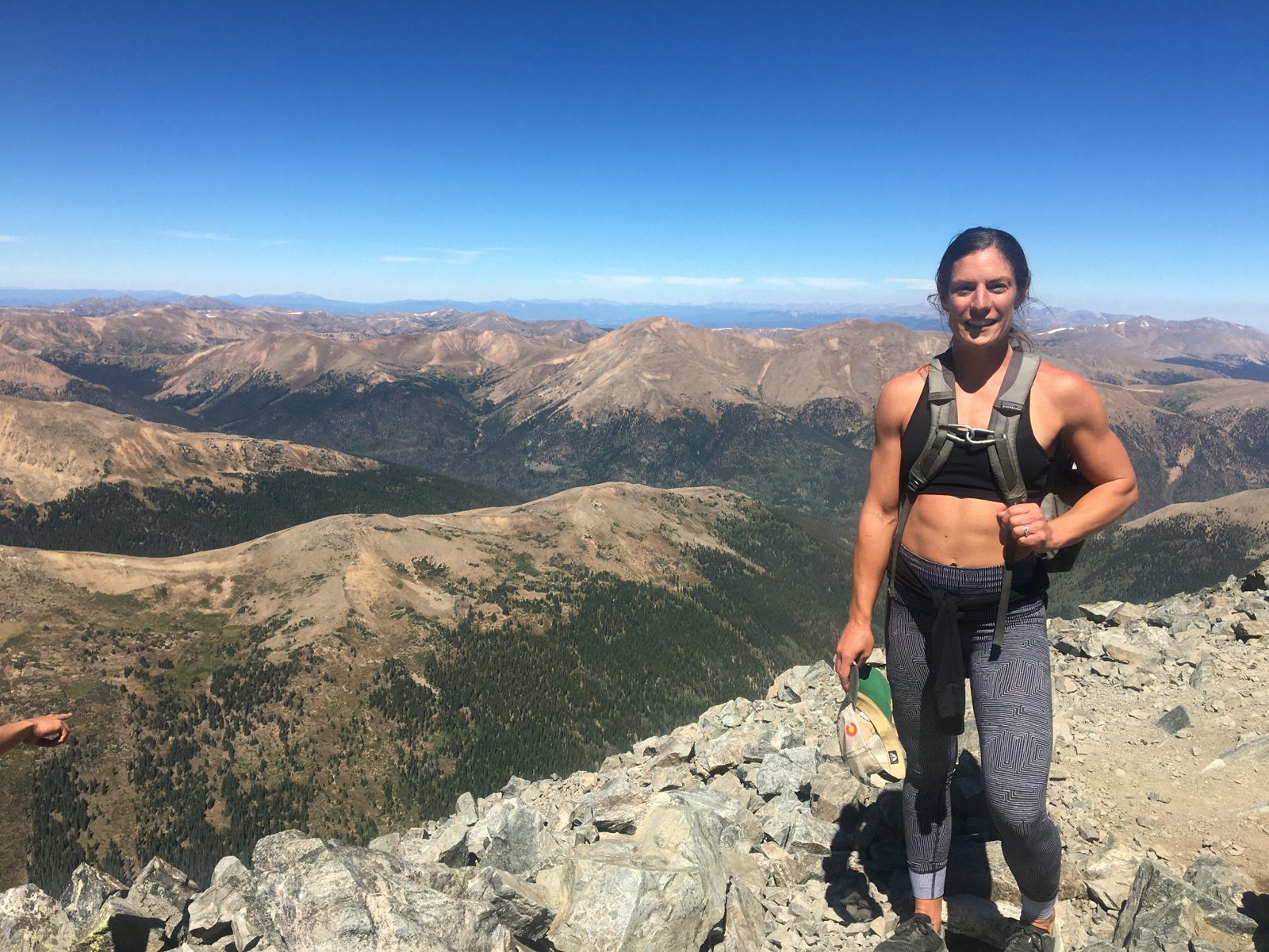 Woman on a mountain summit
